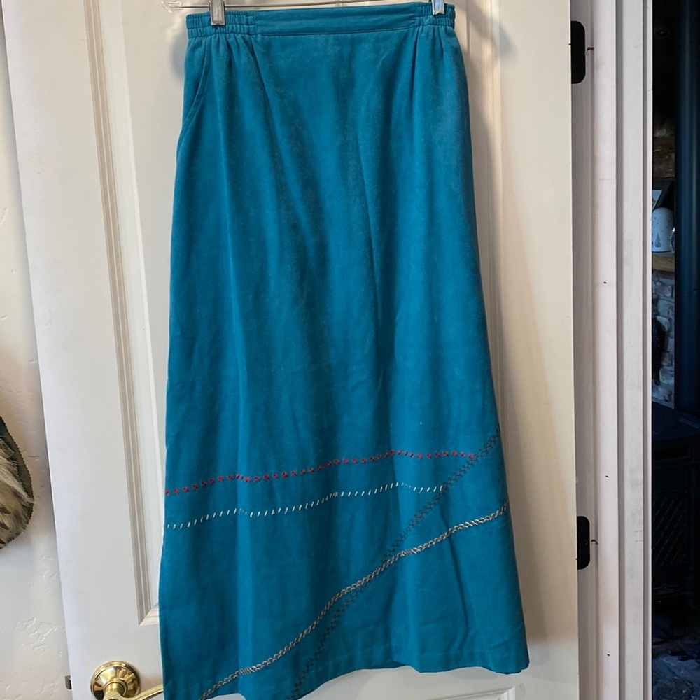 Turquoise skirt with embroidered detailing